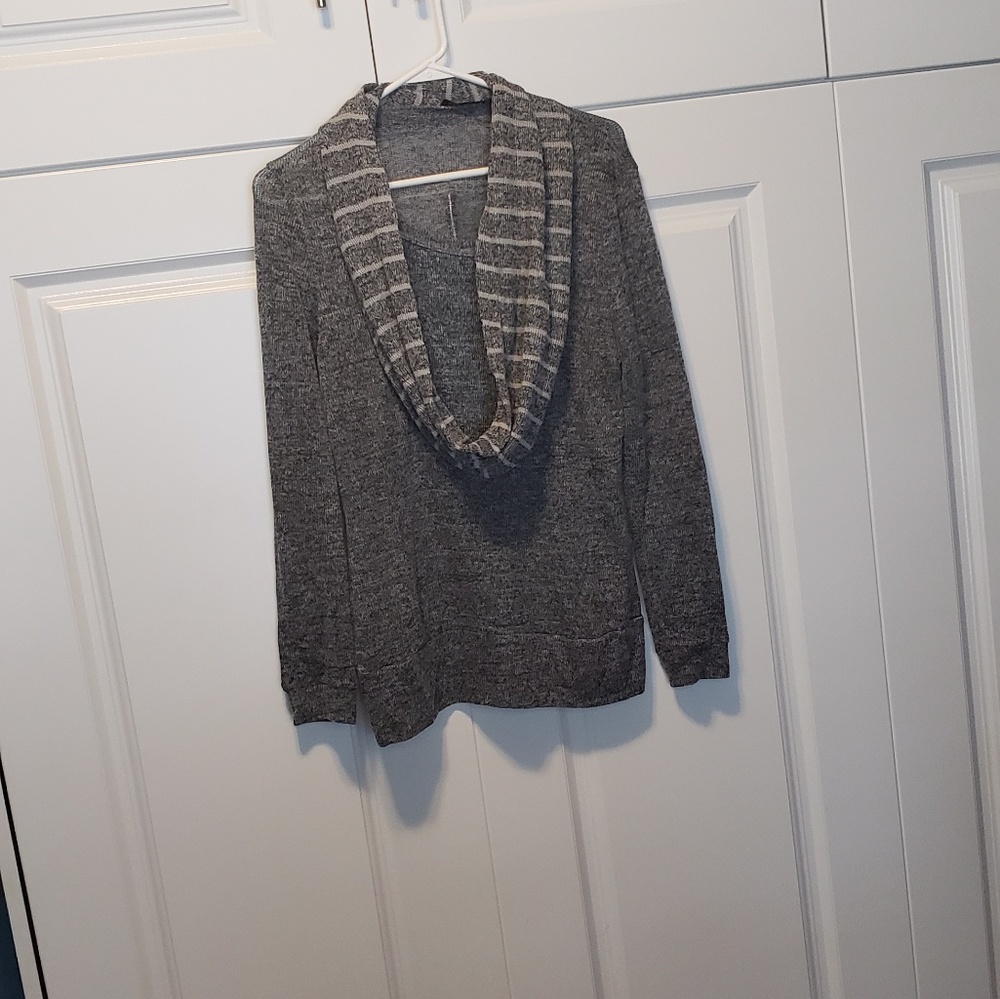 Sweater with attached scarf